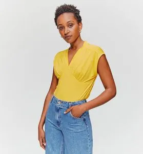 T-shirt col V uni Femme offre à 8,99€ sur Promod