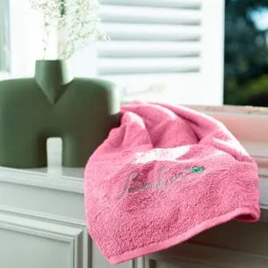 Parure de bain Eloges rose offre à 21,7€ sur carré blanc