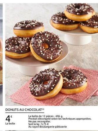 DONUTS AU CHOCOLAT  La boite de 12 pieces - 6969 4 Produit decongelé selon les techniques appropriées. La boite  Ne pas recongeler. Soit le kg: 5.75  Au rayon Boulangerie-pâtisserie