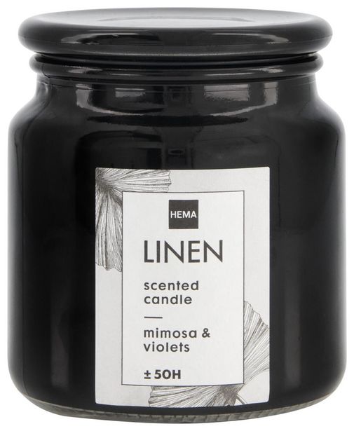 Bougie parfumée dans un pot en verre Ø10x11 lin offre à 1,5€ sur Hema