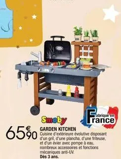 65%  smoby  garden kitchen  cuisine d'extérieure évolutive disposant d'un gril, d'une plancha, d'une friteuse, et d'un évier avec pompe à eau. nombreux accessoires et fonctions mécaniques anti-uv dès 