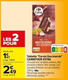 LES 2  POUR  Vendu seul  197  Lekg:735 €  Les 2 pour  249  Le kg: 623 €  P Extra  NOW PUR  NOISETTES ENTIÈRES HELE HAZELNOTEN MUTAS-SCORE  Tablette "Carrés Gourmands" CARREFOUR EXTRA  Chocolat noir no