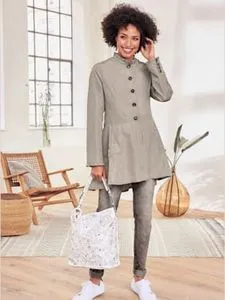 Manteau superbe qualité légèrement brillante offre à 129€ sur Helline