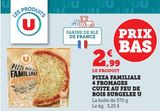 PIZZA FAMILIALE 4 FROMAGES CUITES AU FEU DE BOUS SURGELEE U  offre à 2,99€ sur Super U
