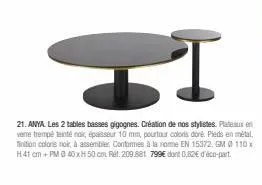 bi  21. anya. les 2 tables basses gigognes. création de nos stylistes. plateaux en verre trempé teinténak, épaisseur 10 mm, pourtour coloris doré. pieds en métal, finition coloris noir, à assembler. c